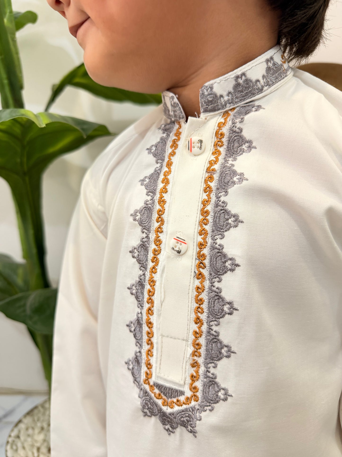 White Kurta Suit with Elegant Embroidered Neckline